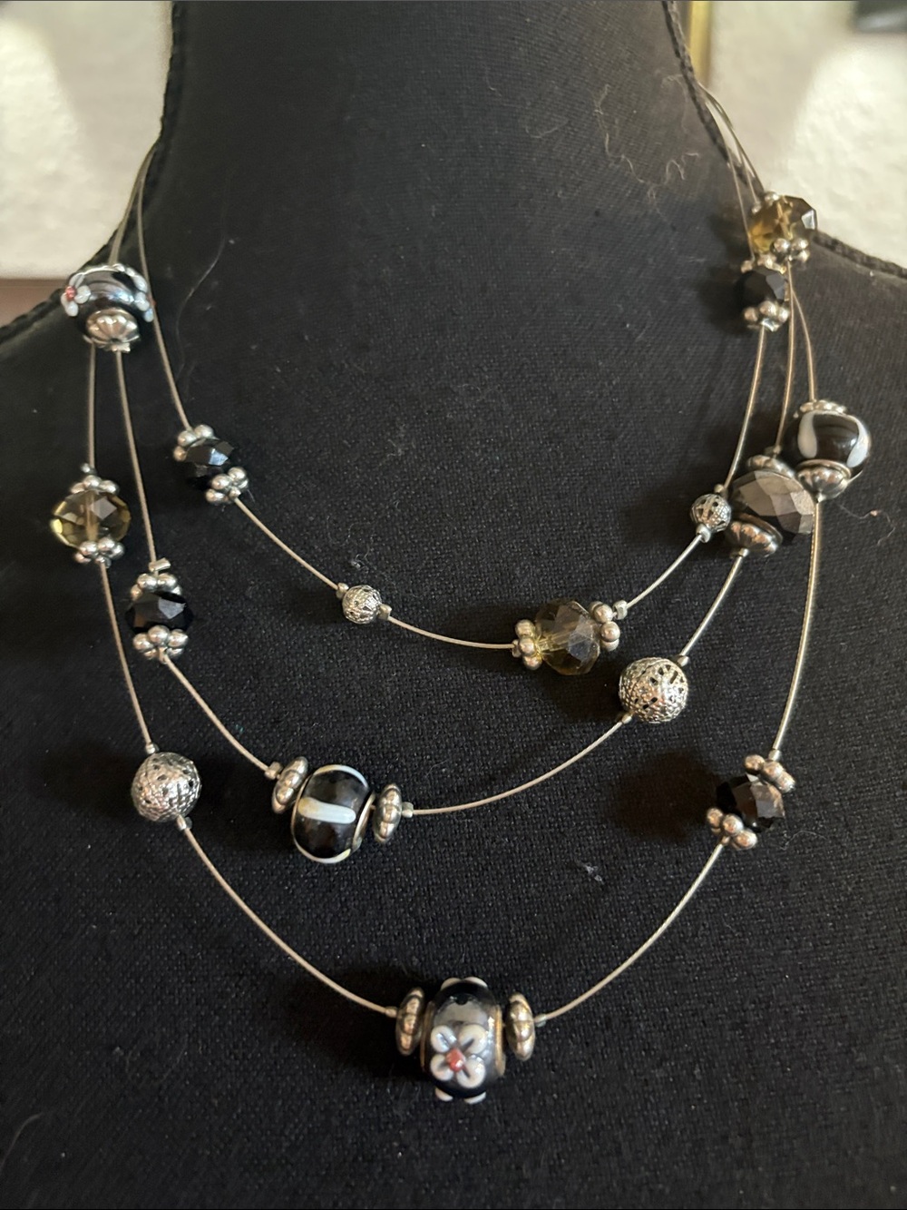 Three-Strand Black Glass Bead Necklace with Silver Filigree Accents